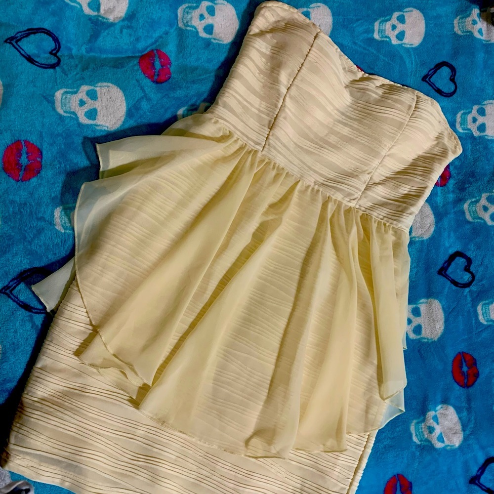 Woman’s size L ivory ruffle short strapless dress